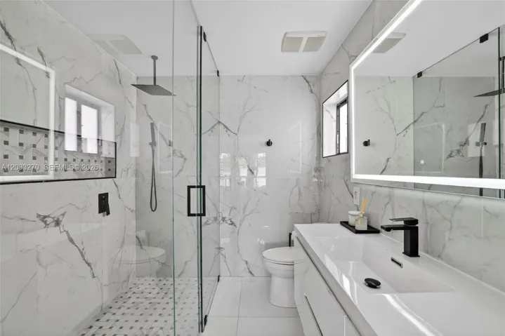 Dual head shower