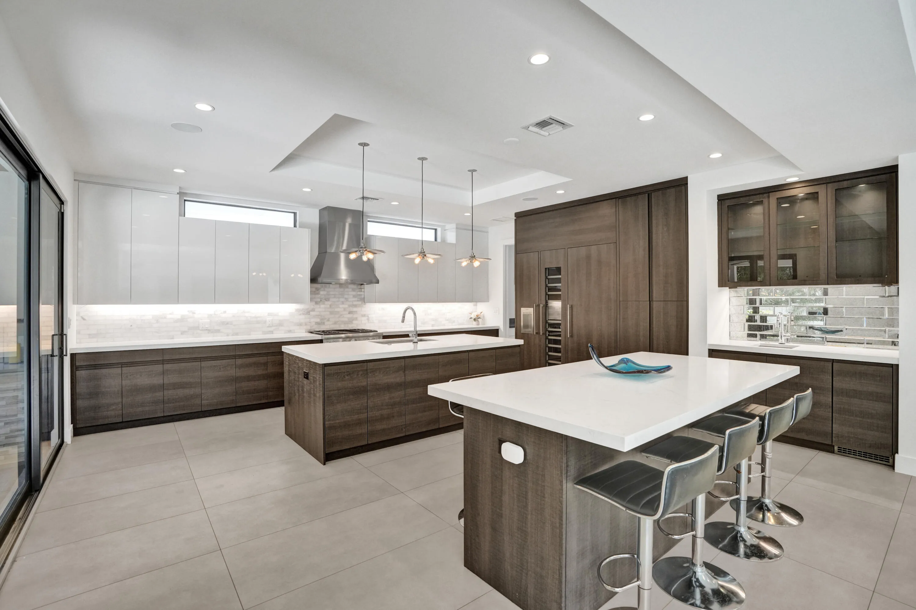 Spacious kitchen with built in custom bar.