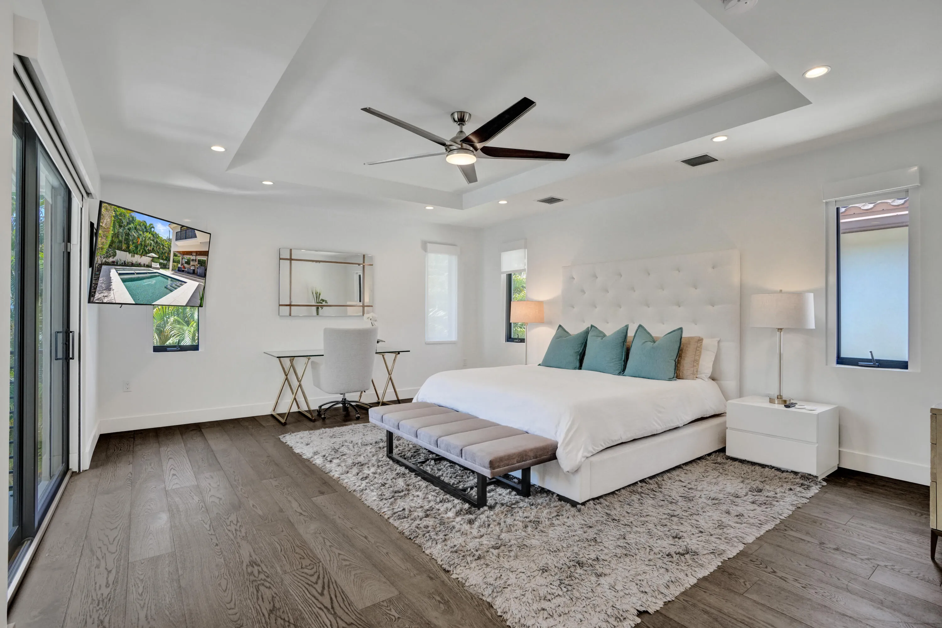 Spacious primary suite with tray ceiling.