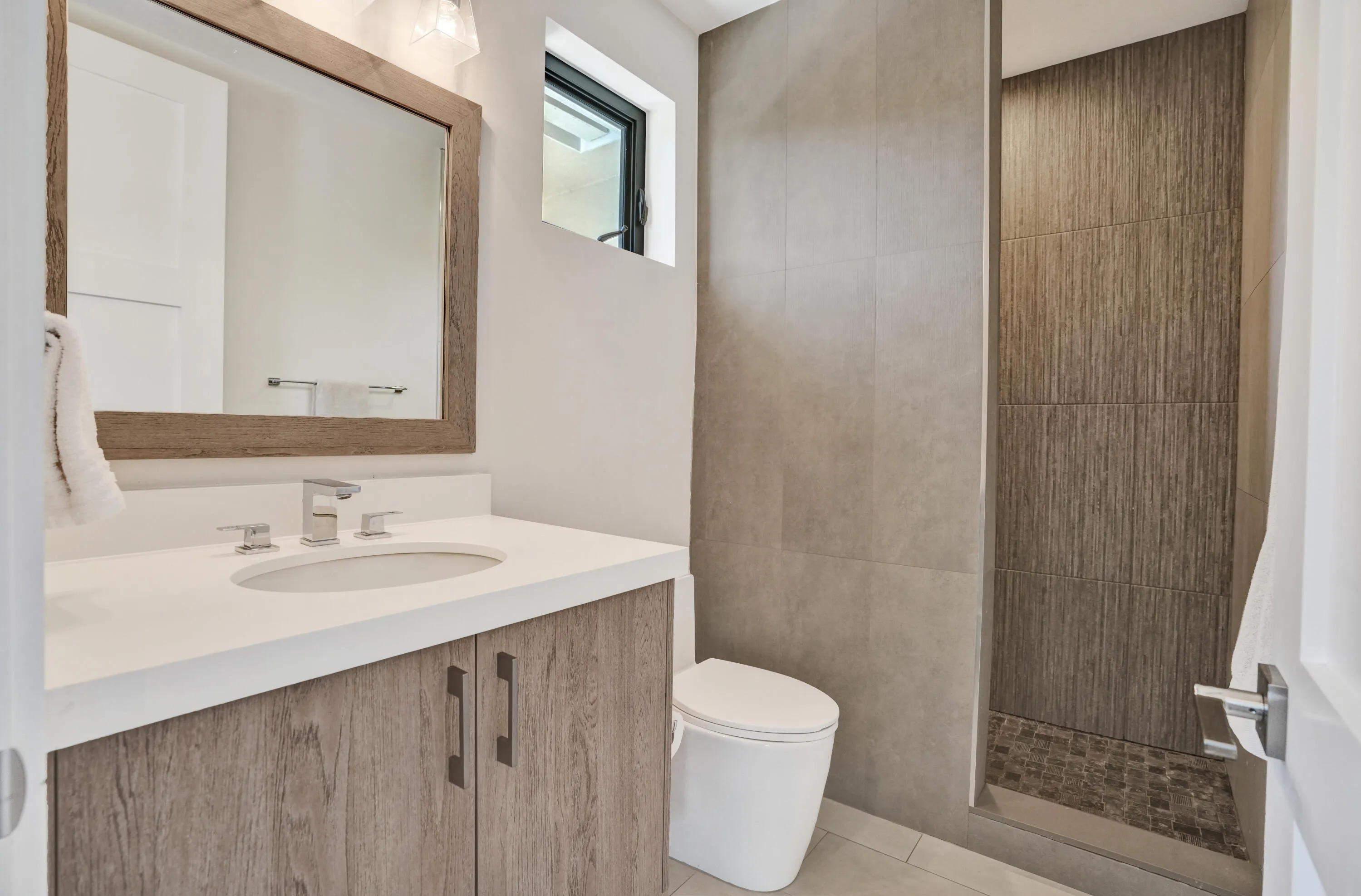 Third ensuite bath with walk in shower.