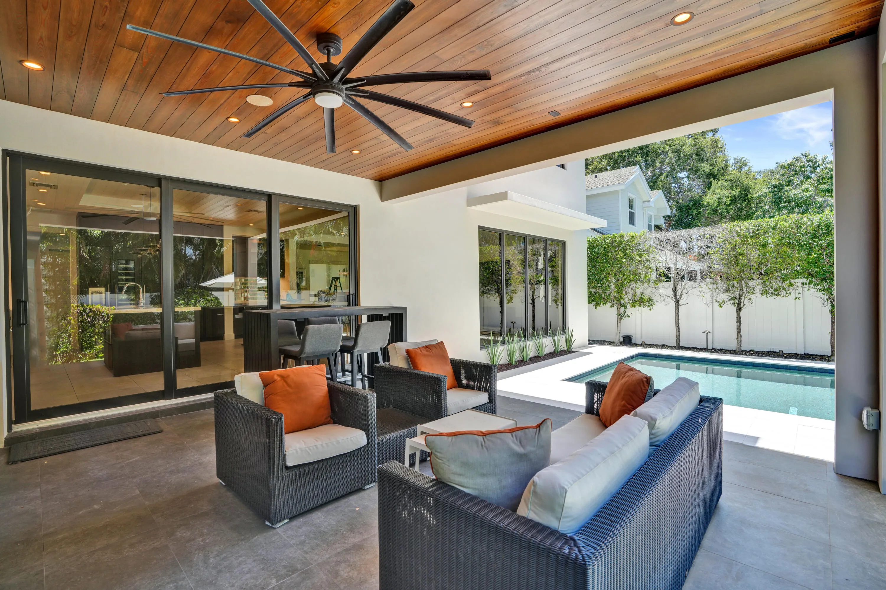 Covered patio with beautiful wood ceilings.