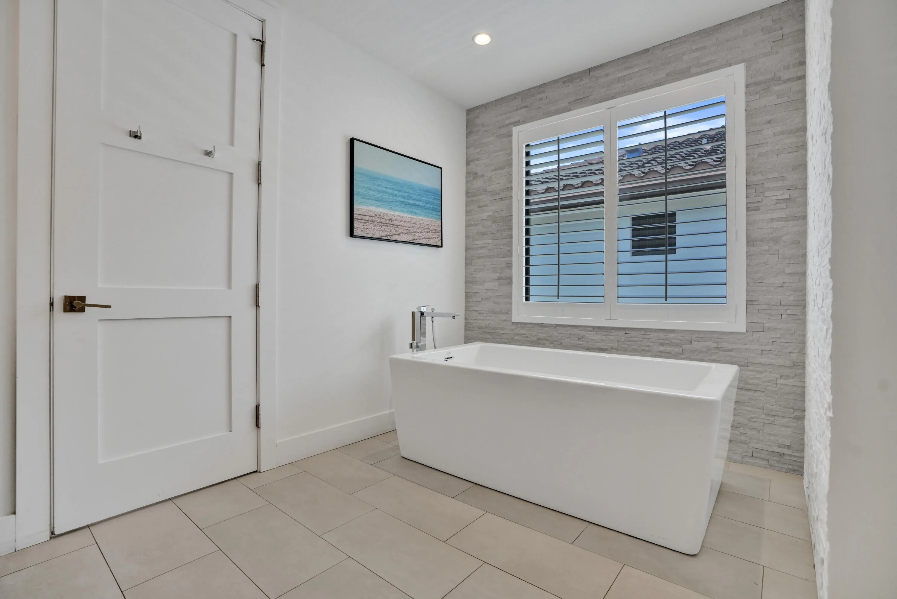 Soaking tub in primary suite.