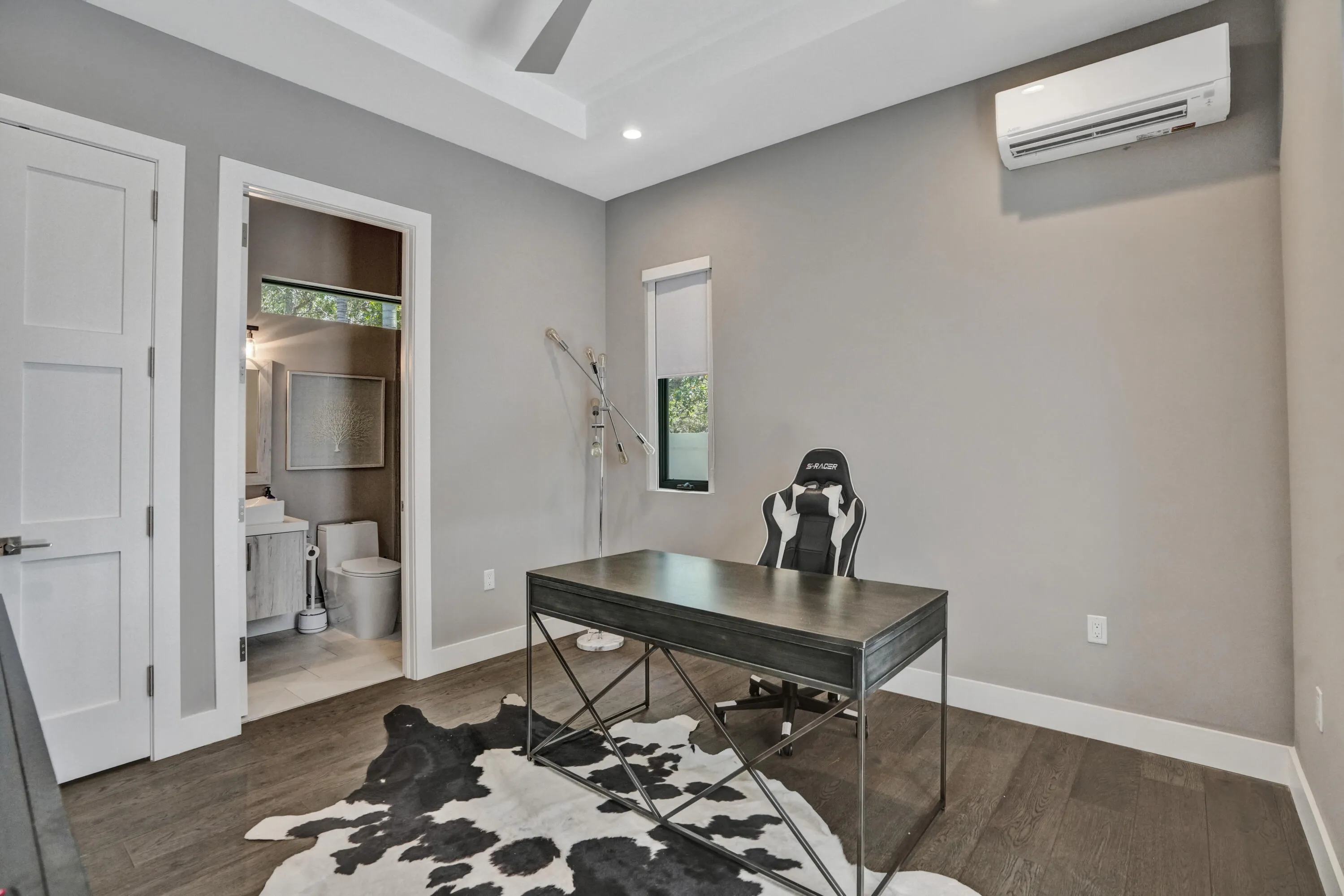 Detached guest suite set up as office.