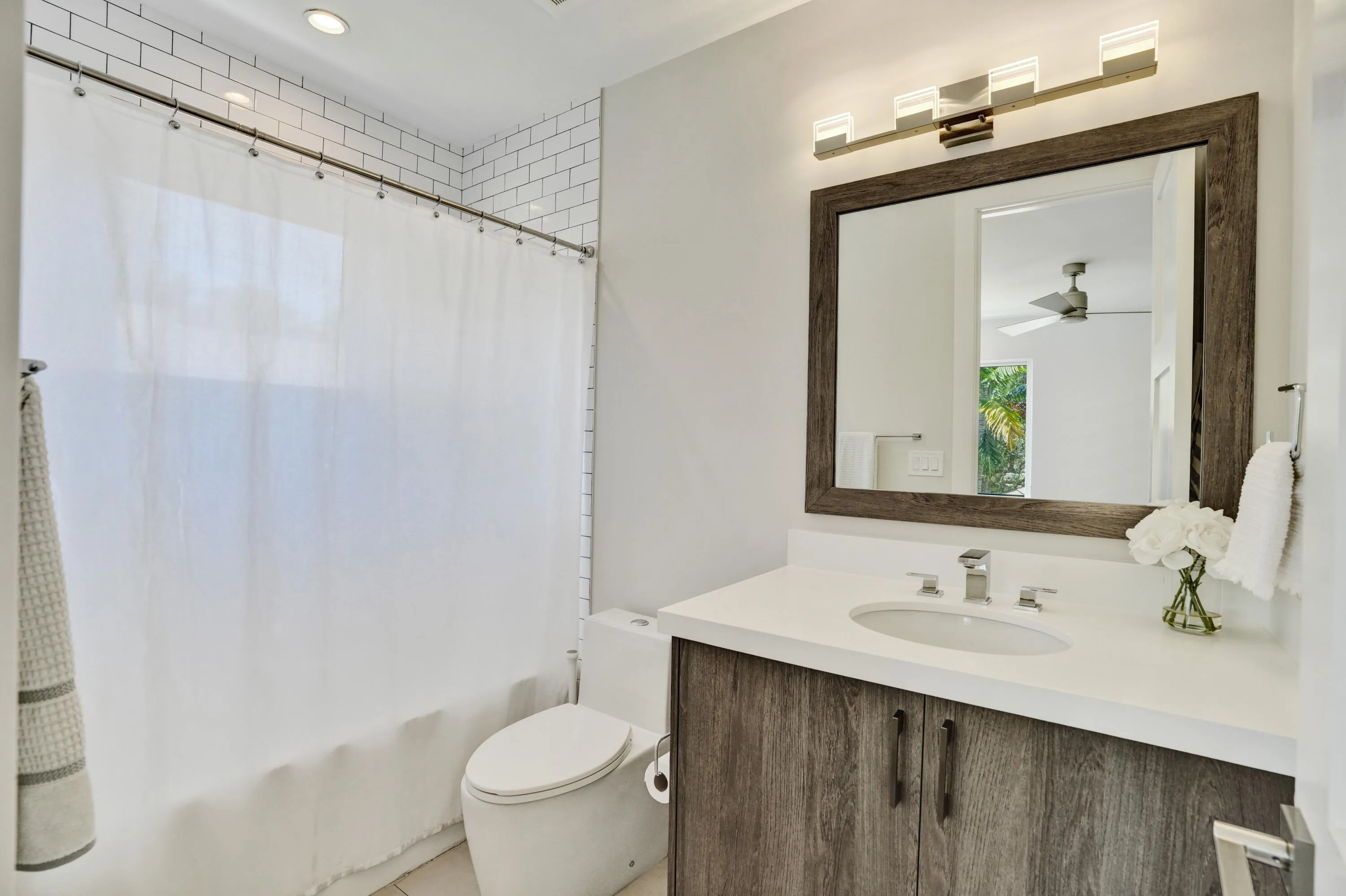 Second ensuite bathroom with tub and shower.