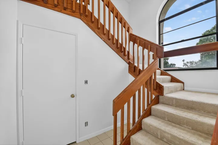 foyer w storage to stairs - ground floor
