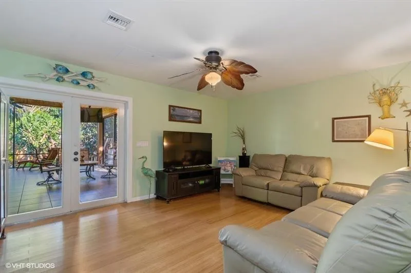 Family room with access to massive screened in patio