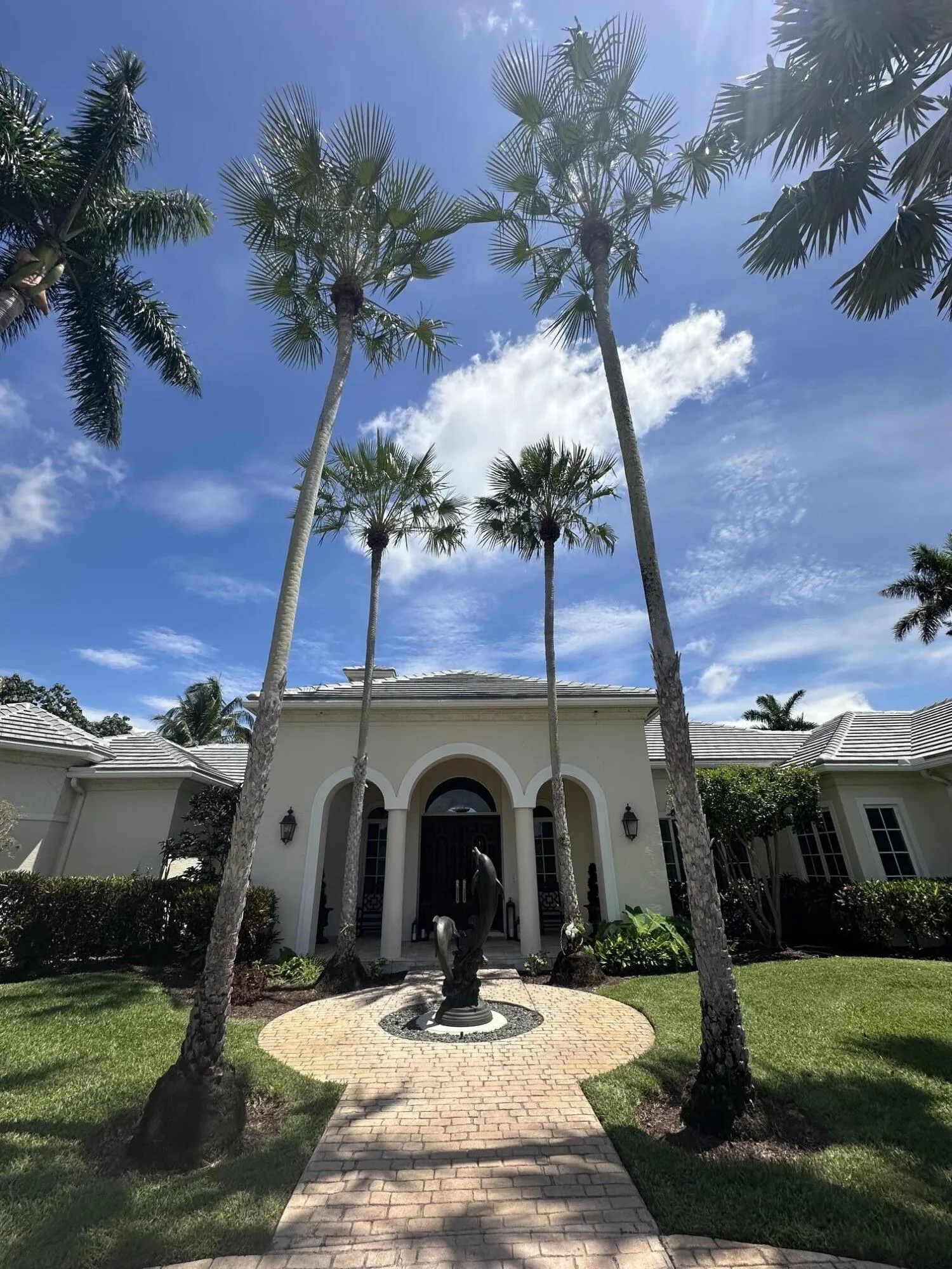 Covered Grand Entrance with Bronze Sculpture