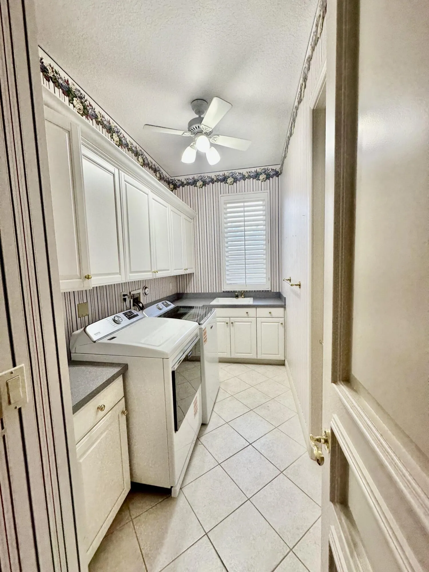 Indoor Laundry Room with Closet attached