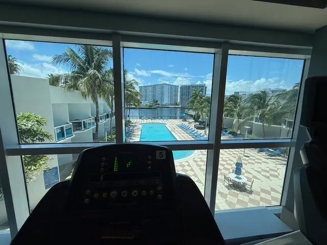 Enjoy pool views while exercising on the treadmill