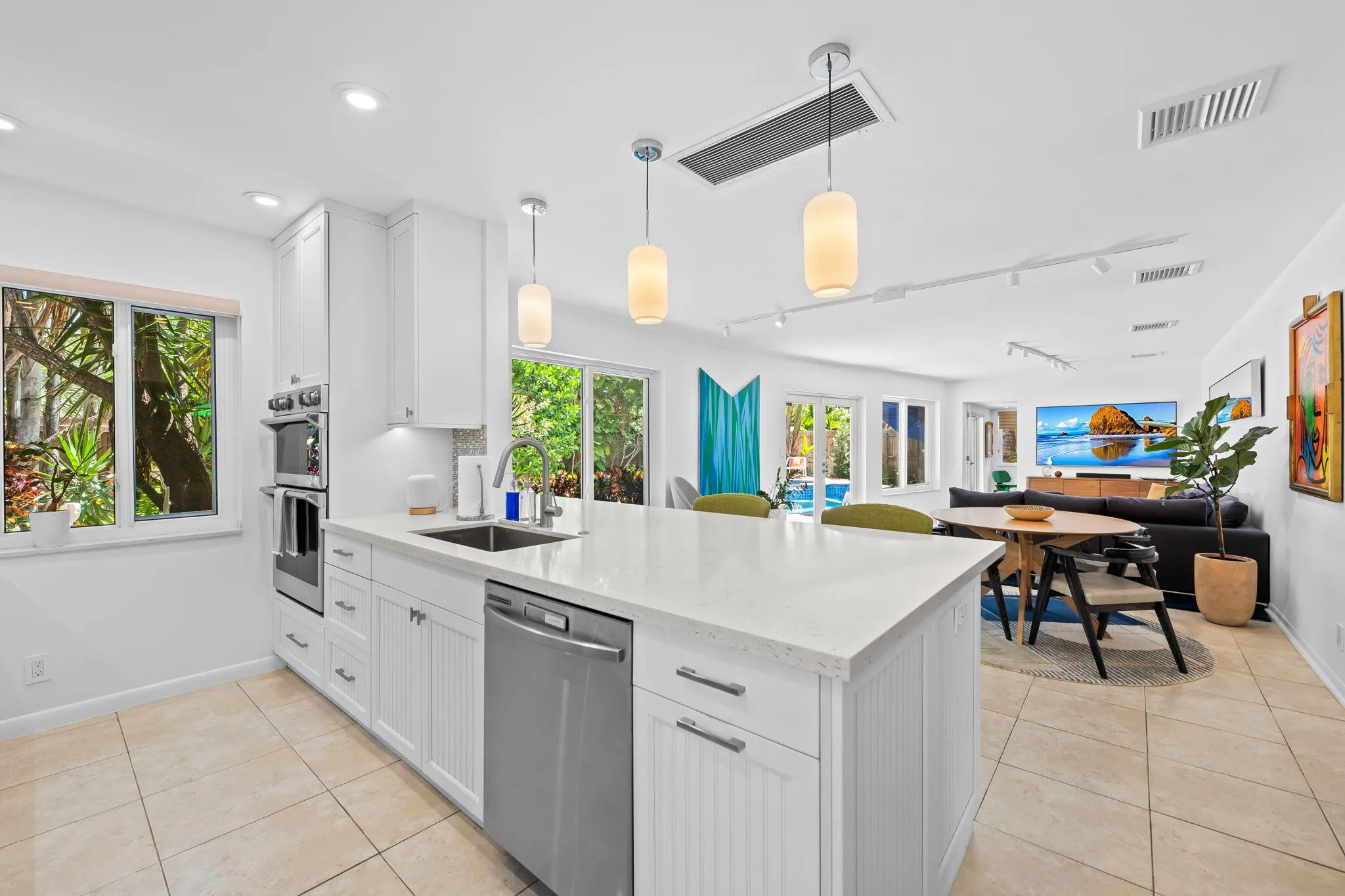 Kitchen open to informal dining and the family room.