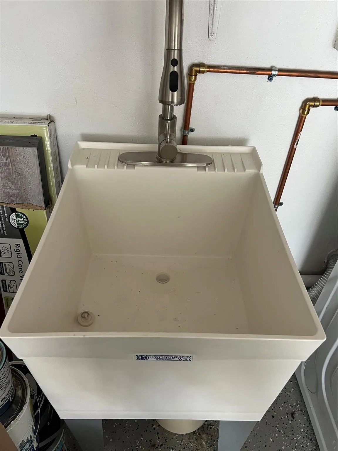 Laundry basin in garage