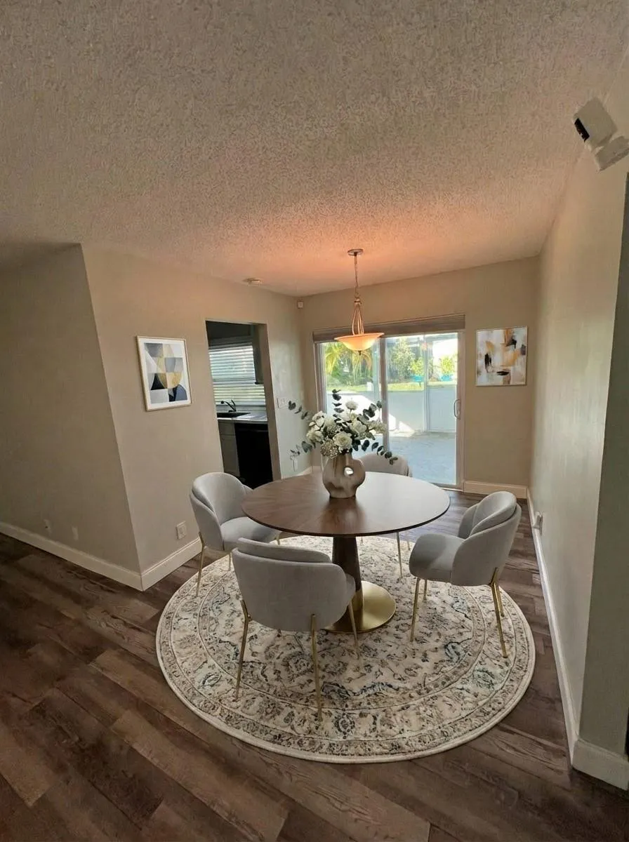 Dining room is located off the kitchen.