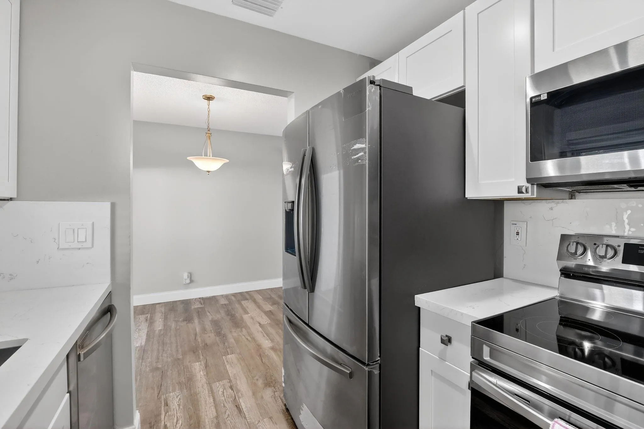 New Stainless Steel Appliances and Cabinetry
