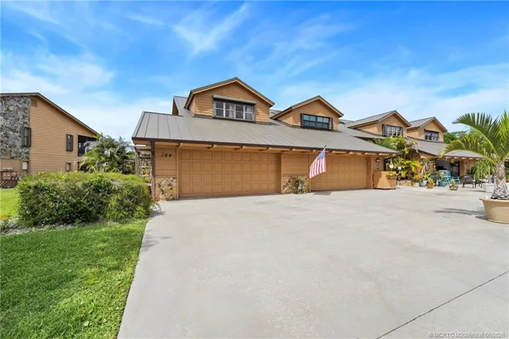 Front with long driveway.