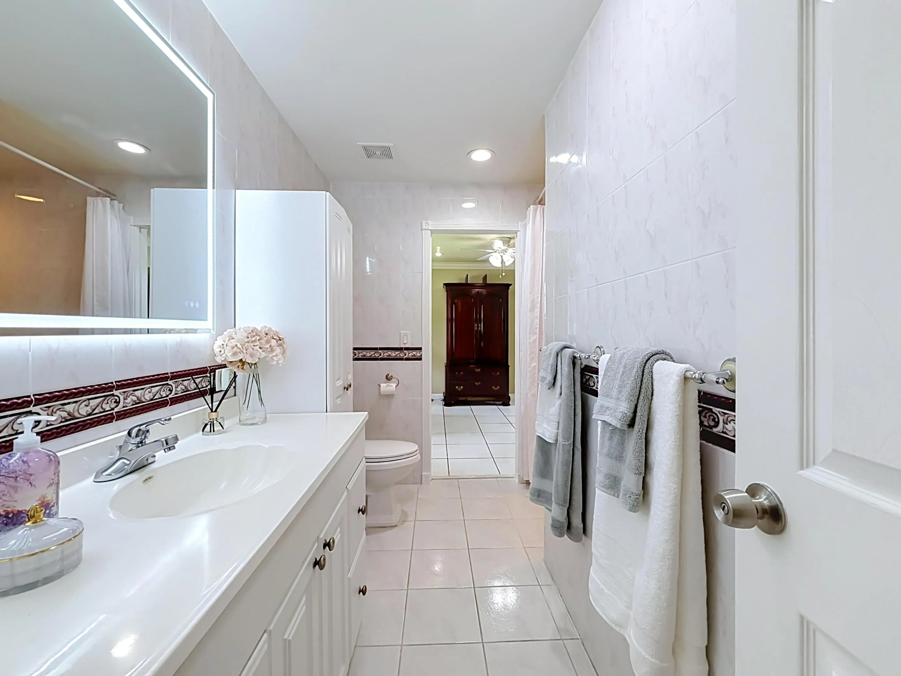 Primary bath facing 5th bedroom
