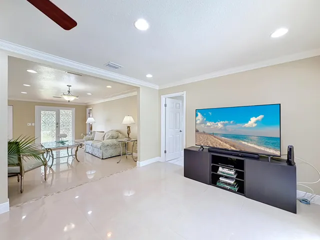 Family room into 5th bedroom and living room