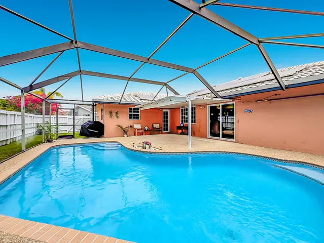 Large pool area, seating, yard
