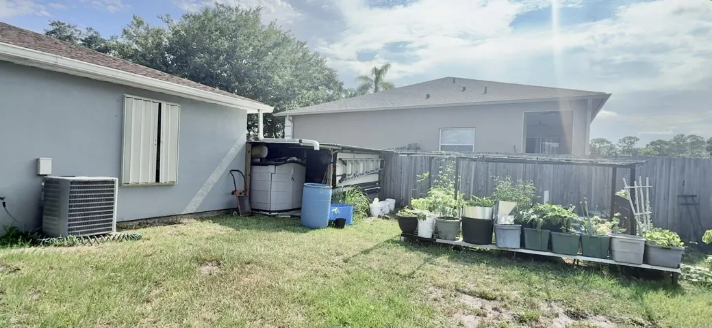 separate shed - easily removable- seller will remove this before closing unless buyers want it to stay