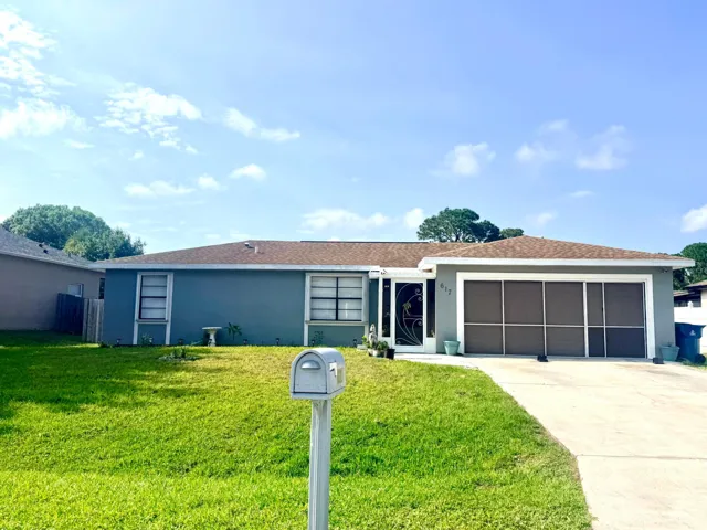 Outdoor Living at Its Best! This 3-bedroom, 2-bath home features a screened summer kitchen and deck, screened garage, and plenty of room for a future pool. Major updates include a 2018 roof, 2018 A/C, and 2024 water heater—offering comfort, value, and peace of mind!