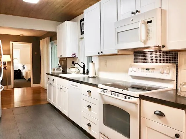 Built-in microwave, range and ample counter space.