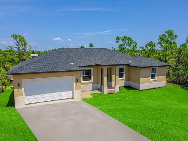 Front Exterior with Attached Garage
