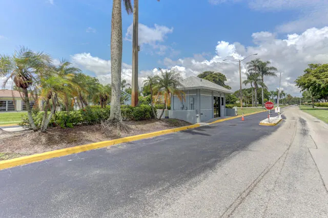 Manned gate for Palm Club Village.