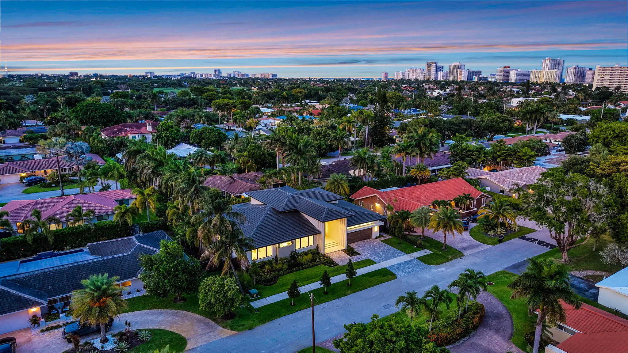 The overhead view highlights the property's lot position, private pool layout, and established Coral Ridge neighborhood setting.