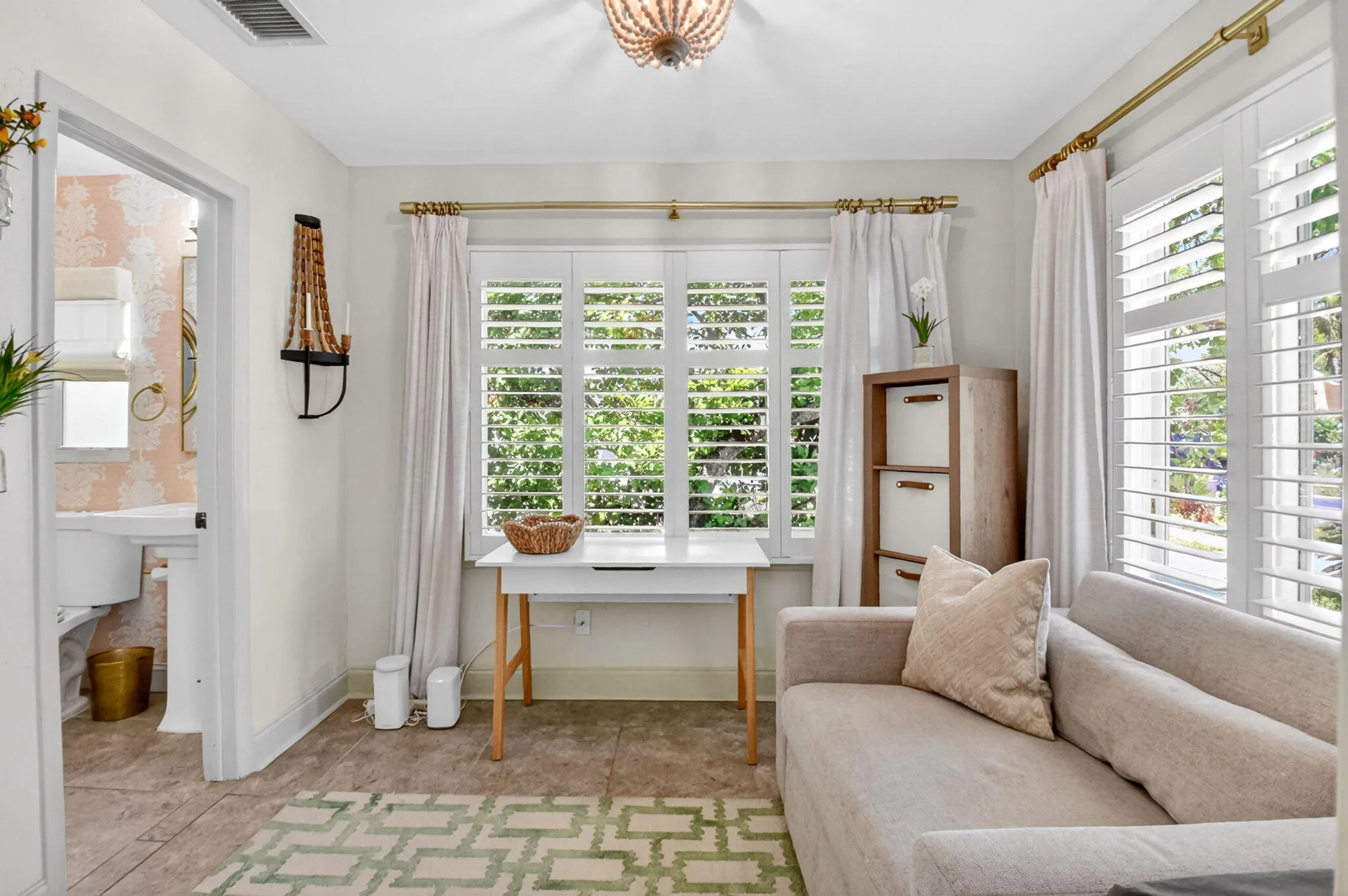 3rd bedroom is currently set up as an office. Beautiful natural light and adjoining 2nd bathroom.
