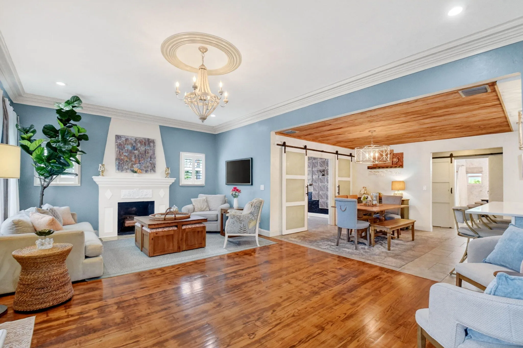 Adjoining dining area with pecky cypress ceilings.
