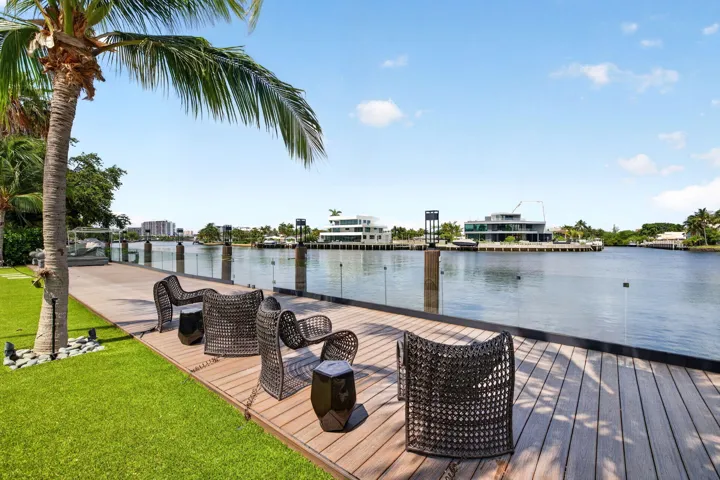 A premier riverfront lifestyle moment highlighting expansive water views, private dockage, and the rare sense of openness that defines this Middle River estate.