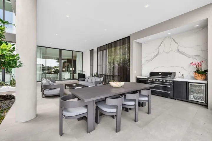 An elegant culinary environment designed for both daily living and grand entertaining, with custom cabinetry, refined surfaces, and effortless flow to the main living spaces.