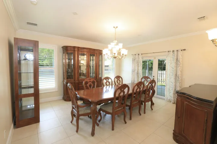 FRENCH DOORS OUT TO COVERED/SCREEN LANAI