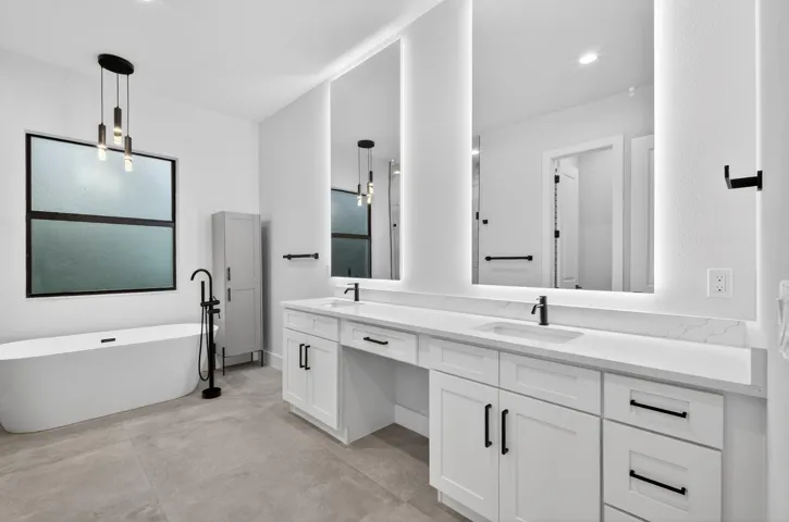 19 - Primary Bathroom Tub And Vanity
