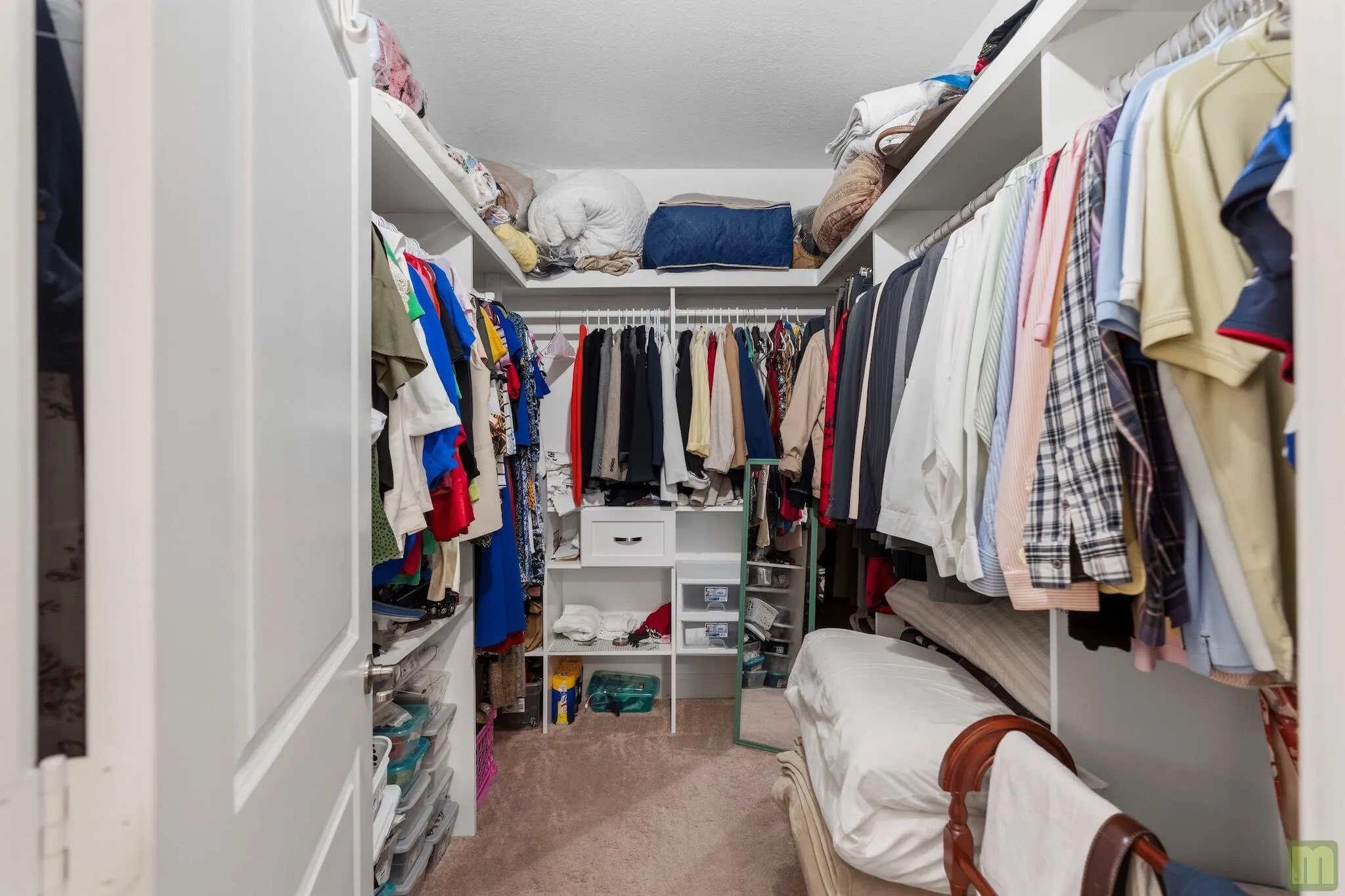 Primary Bedroom walk-in closet