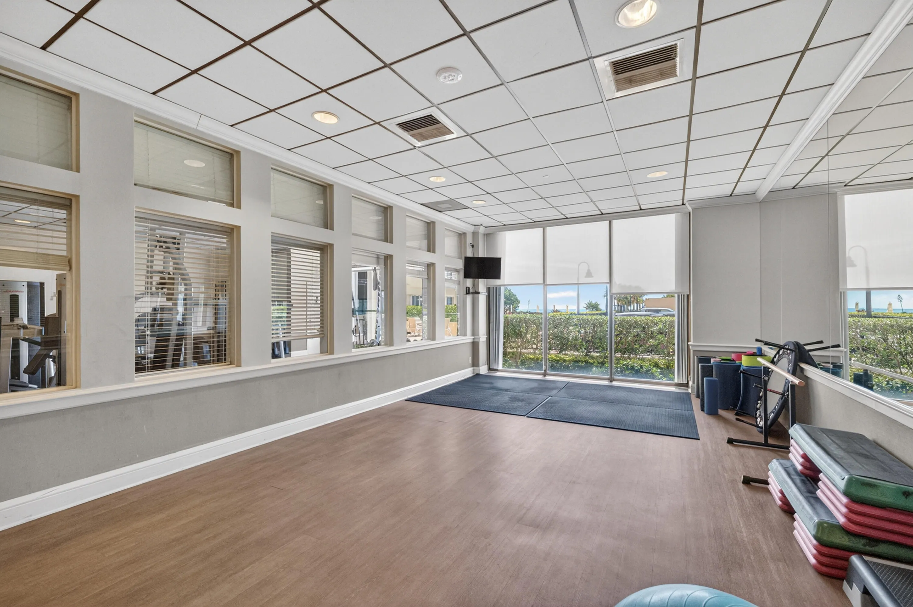 One of two rooms in fitness center - mats, balls, steps, weights, barre, etc.