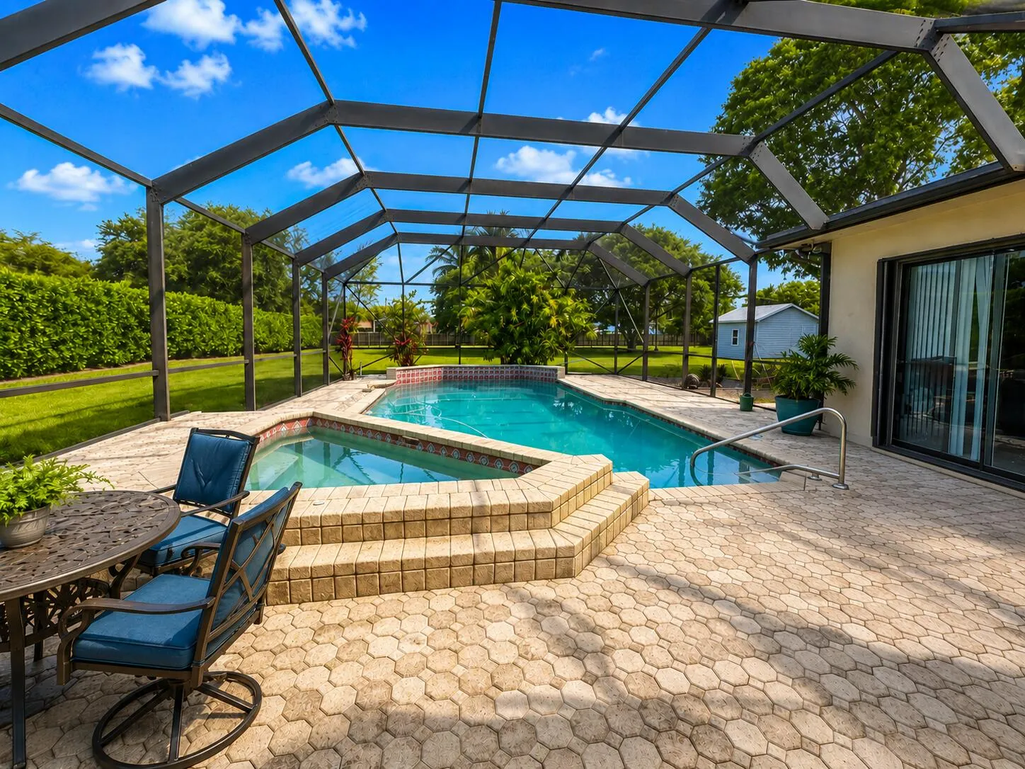 Pool with screen enclosure