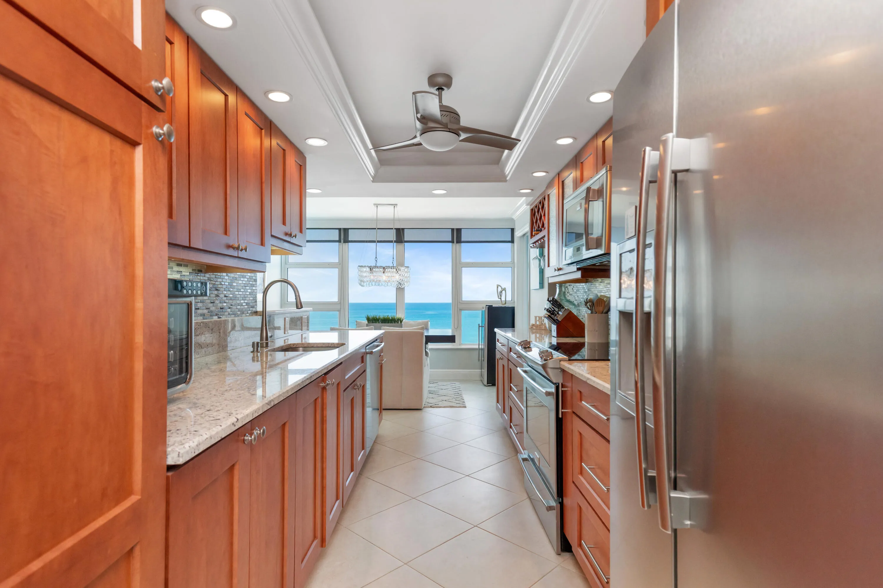 Large kitchen with tons of counter space and cabinetry.