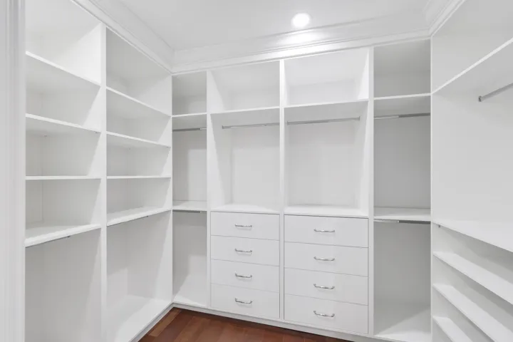 One of the Primary Walk-In Closets
