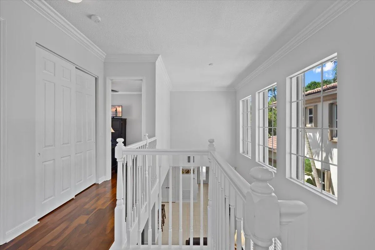 Hallway To Upstairs Owner's Suite