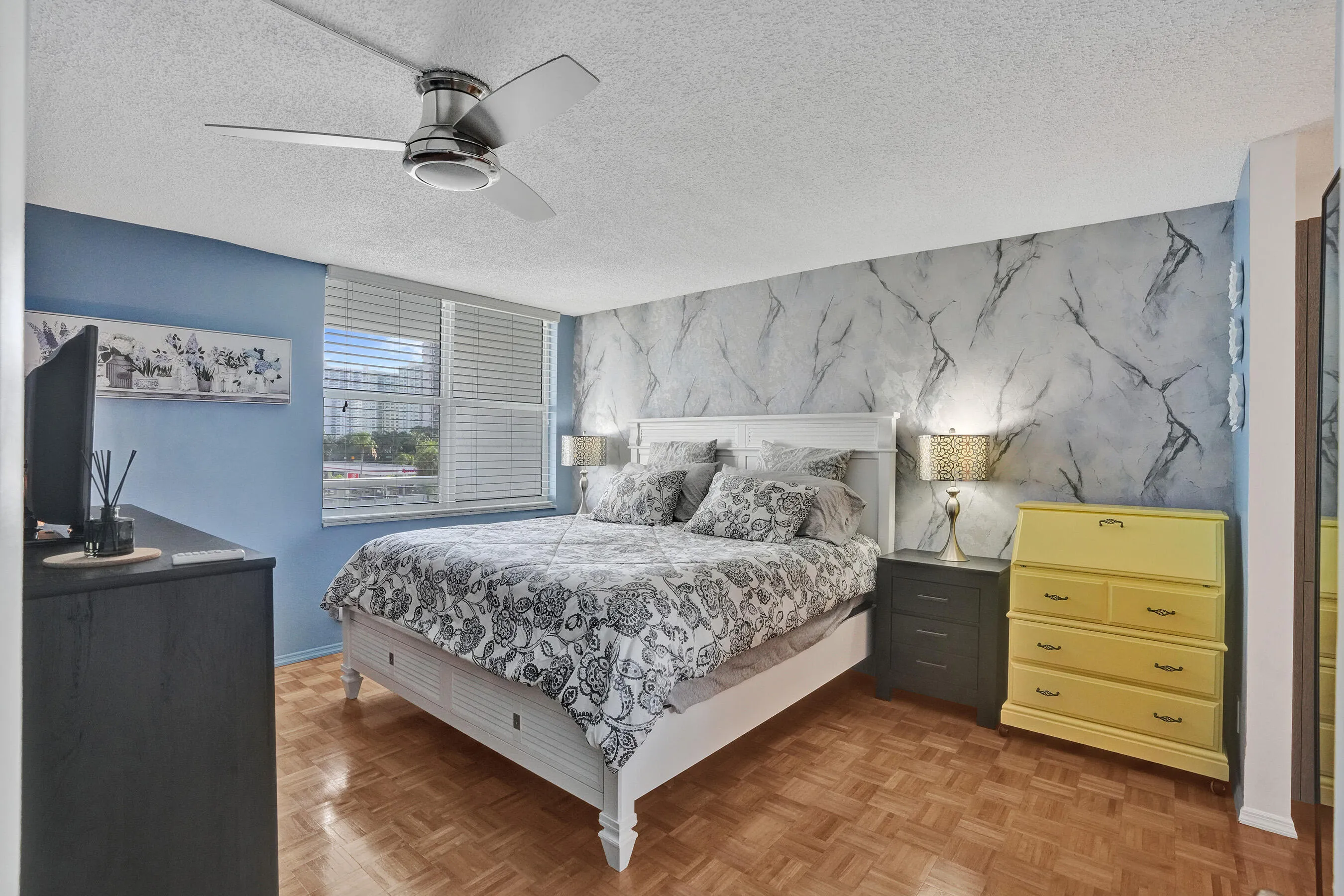 Primary bedroom with large king size bed