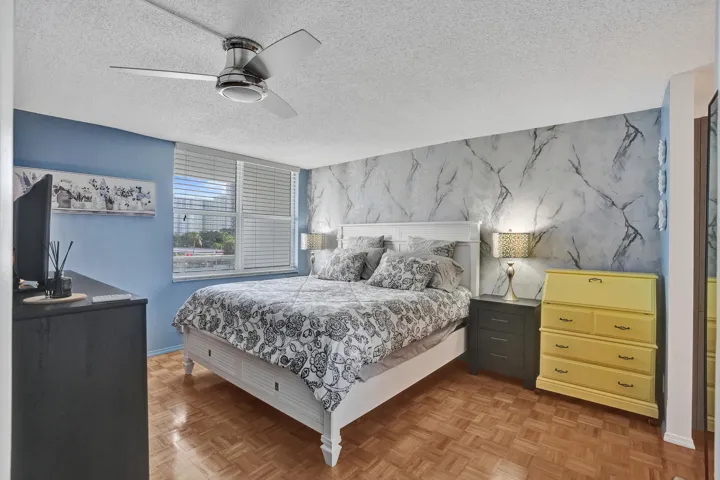 Primary bedroom with large king size bed