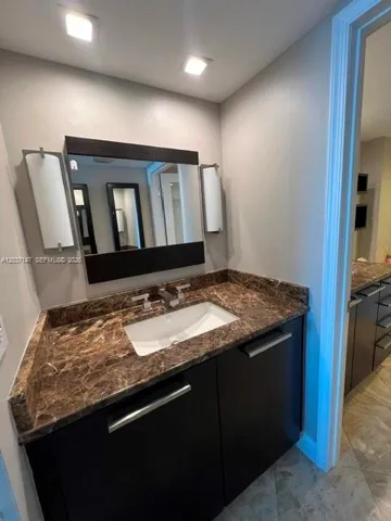 Powder sink before master bathroom