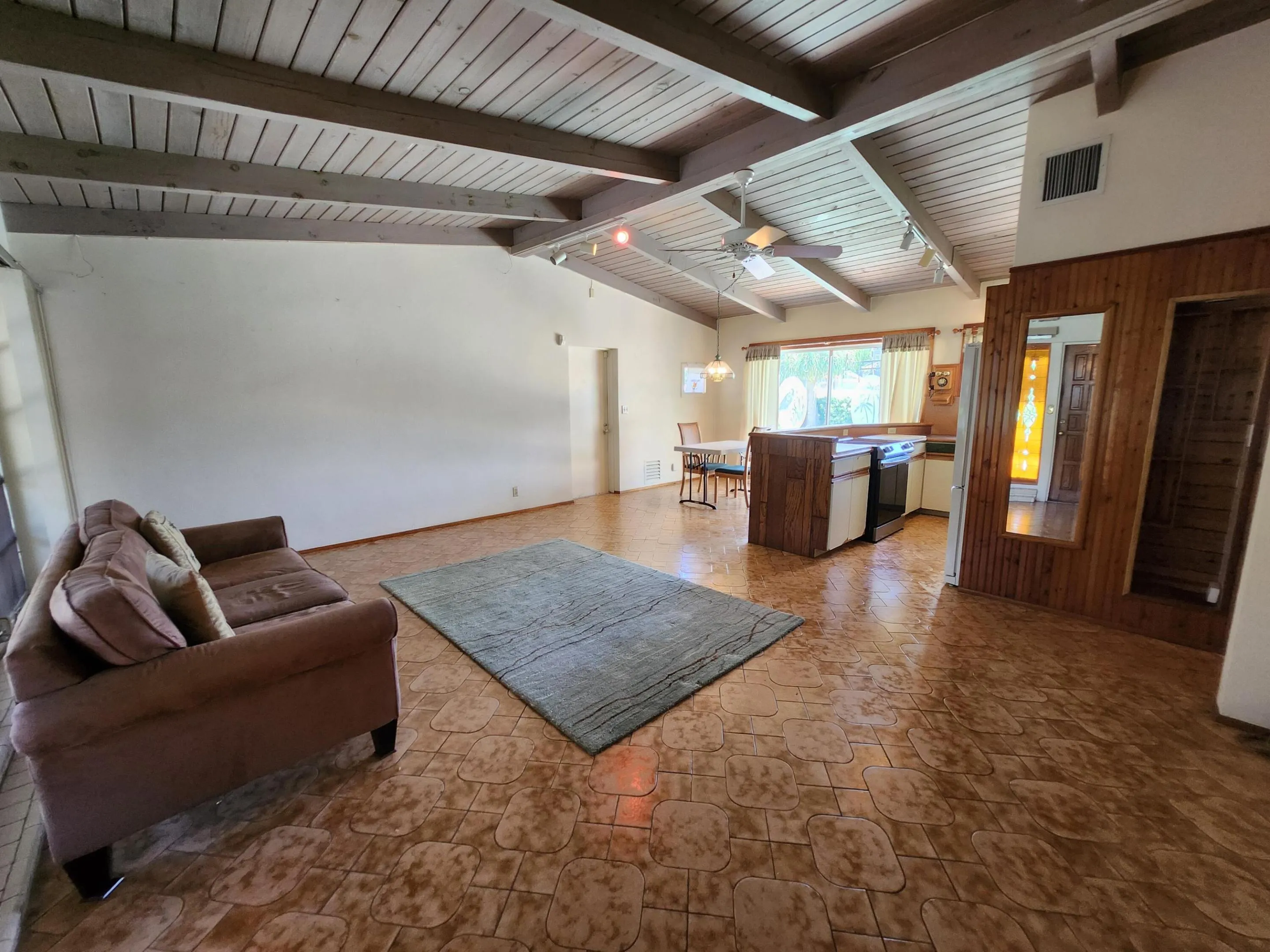 With raised, beamed ceiling!