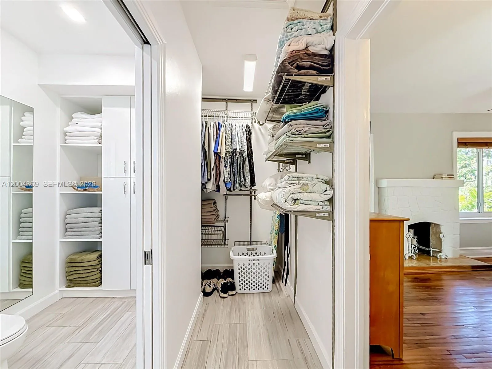 Two walk-in closets on either side of entrance to bathroom