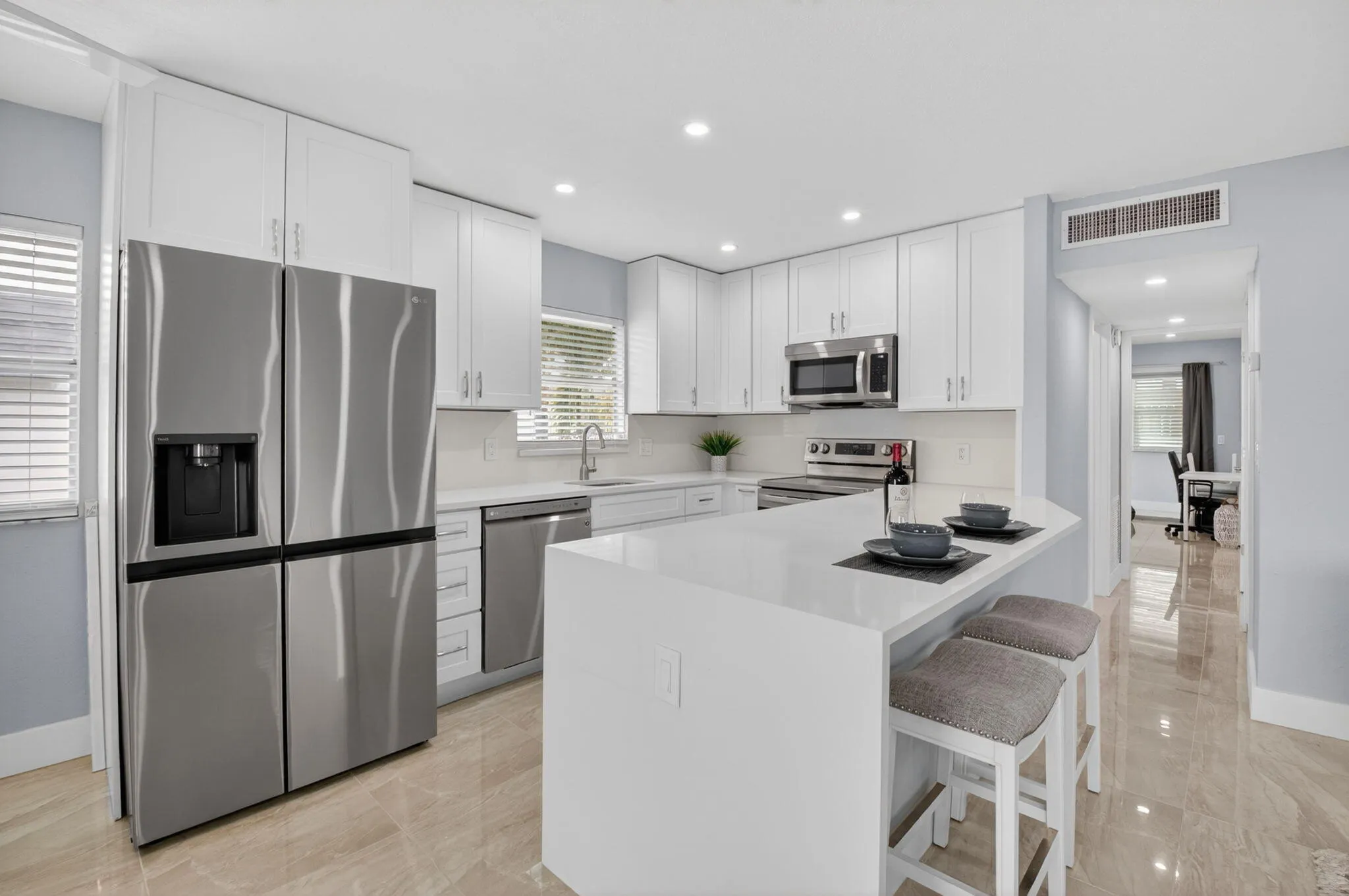 Quartz countertops & stainless steel appliances make for the perfect kitchen!