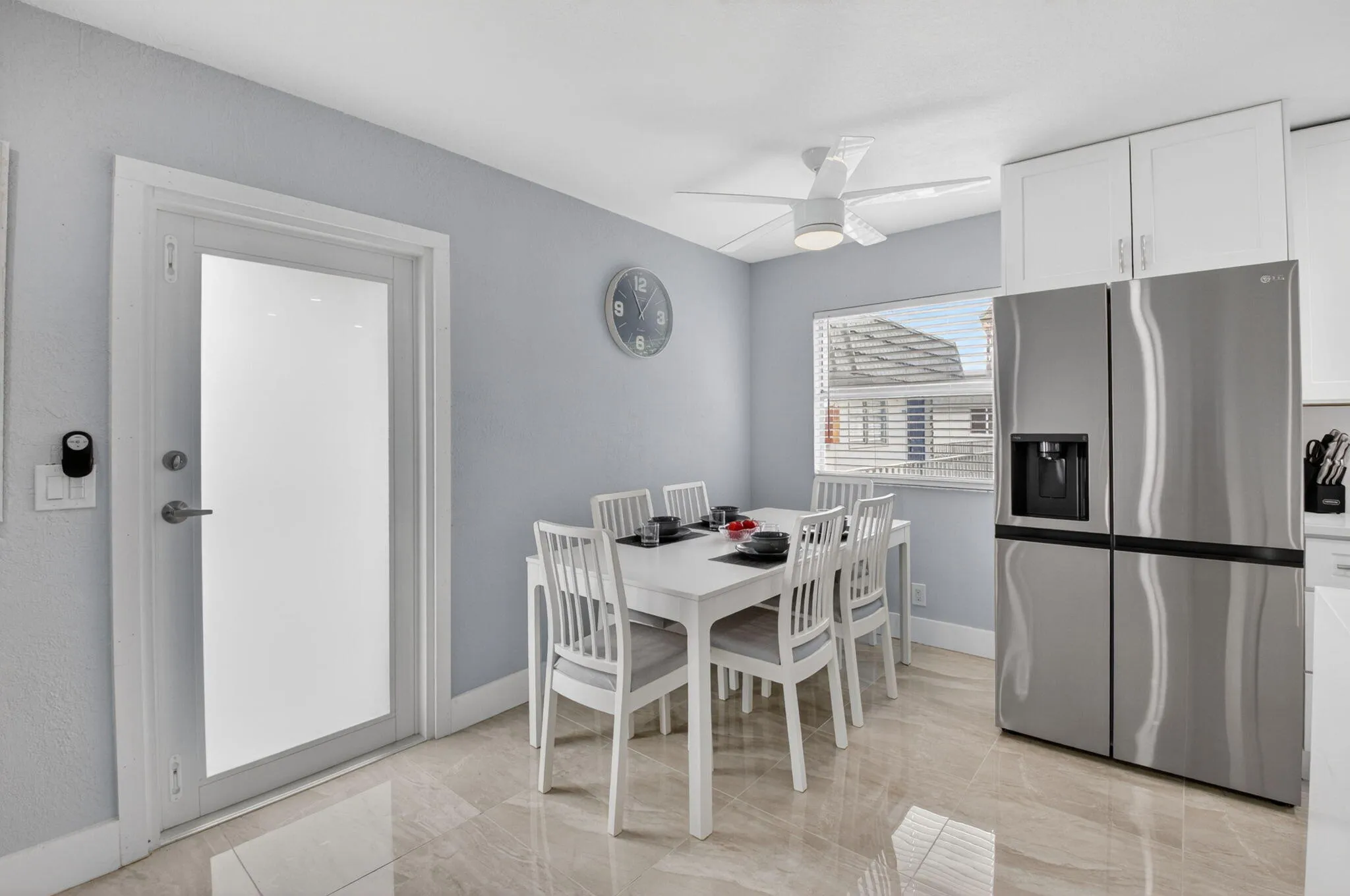 Eat-in kitchen with modern furnishings and room for 6 for dinner!
