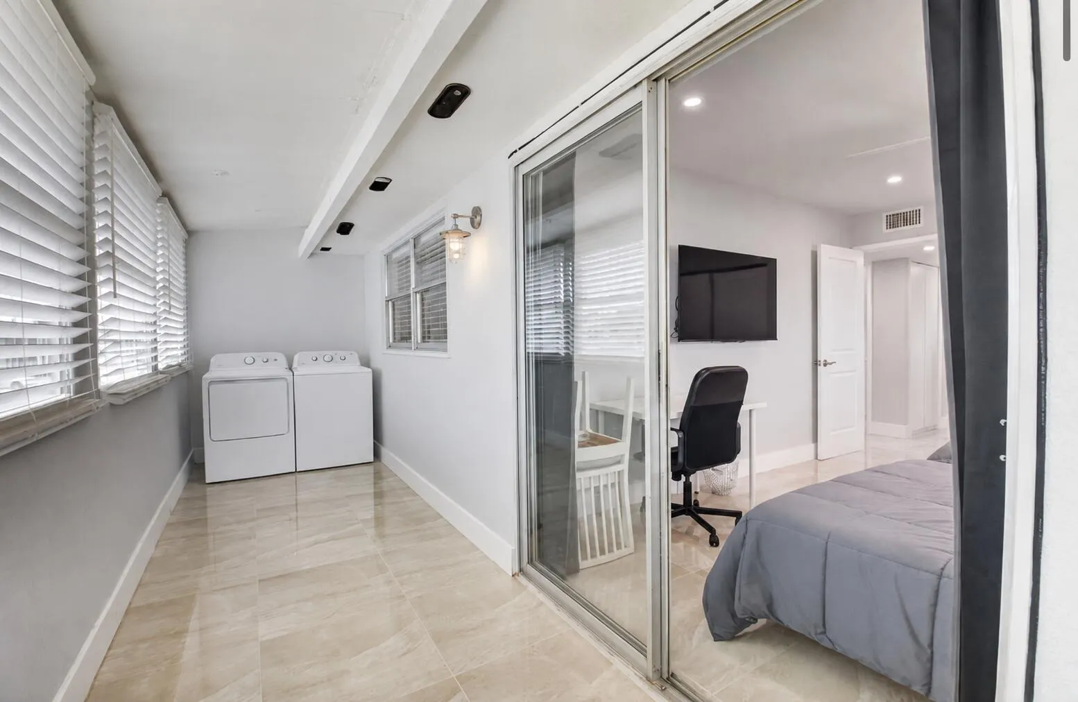 Large patio features full-sized washer and dryer & plenty of room for storage!
