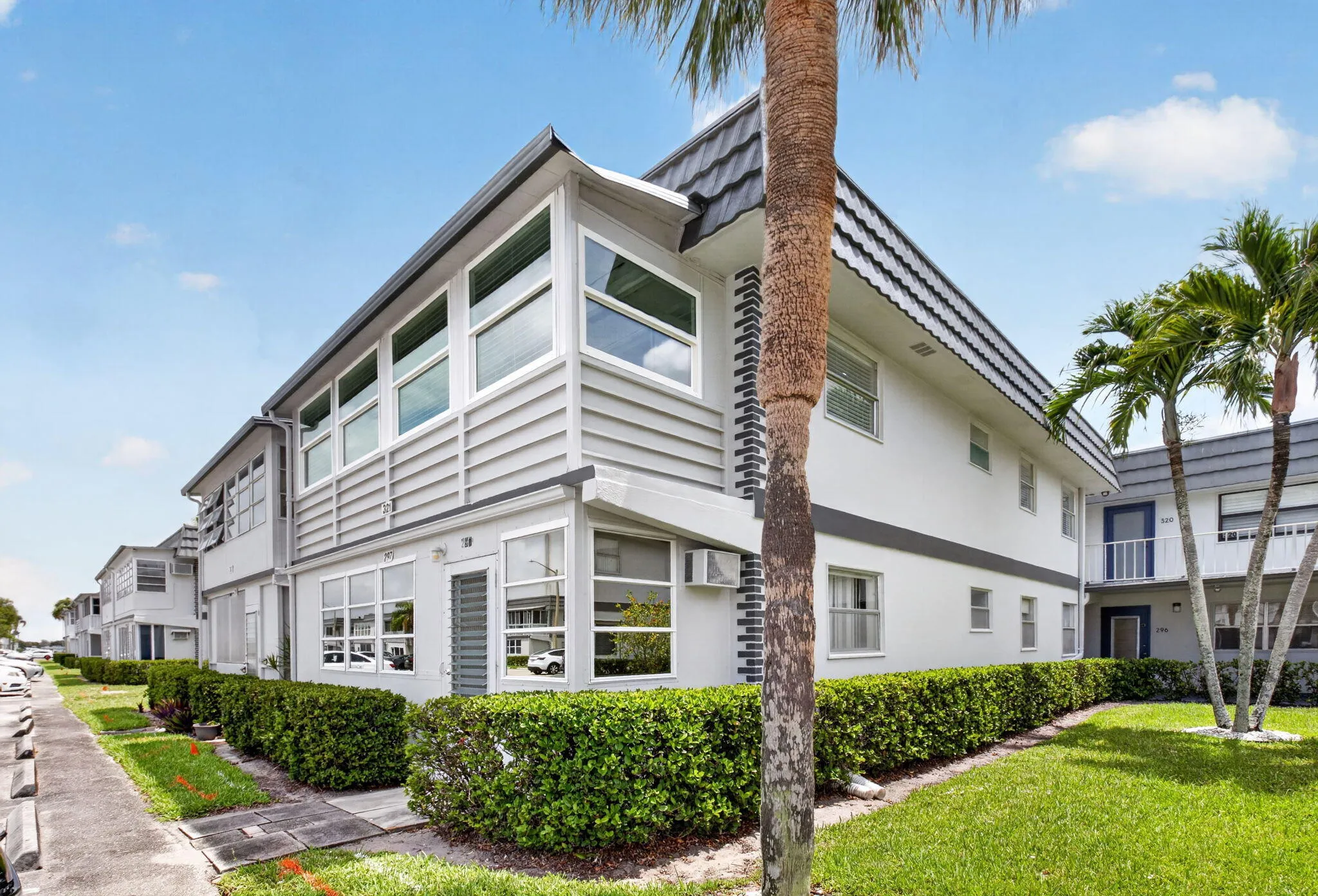 Building features new front doors, exterior lighting and roofs!