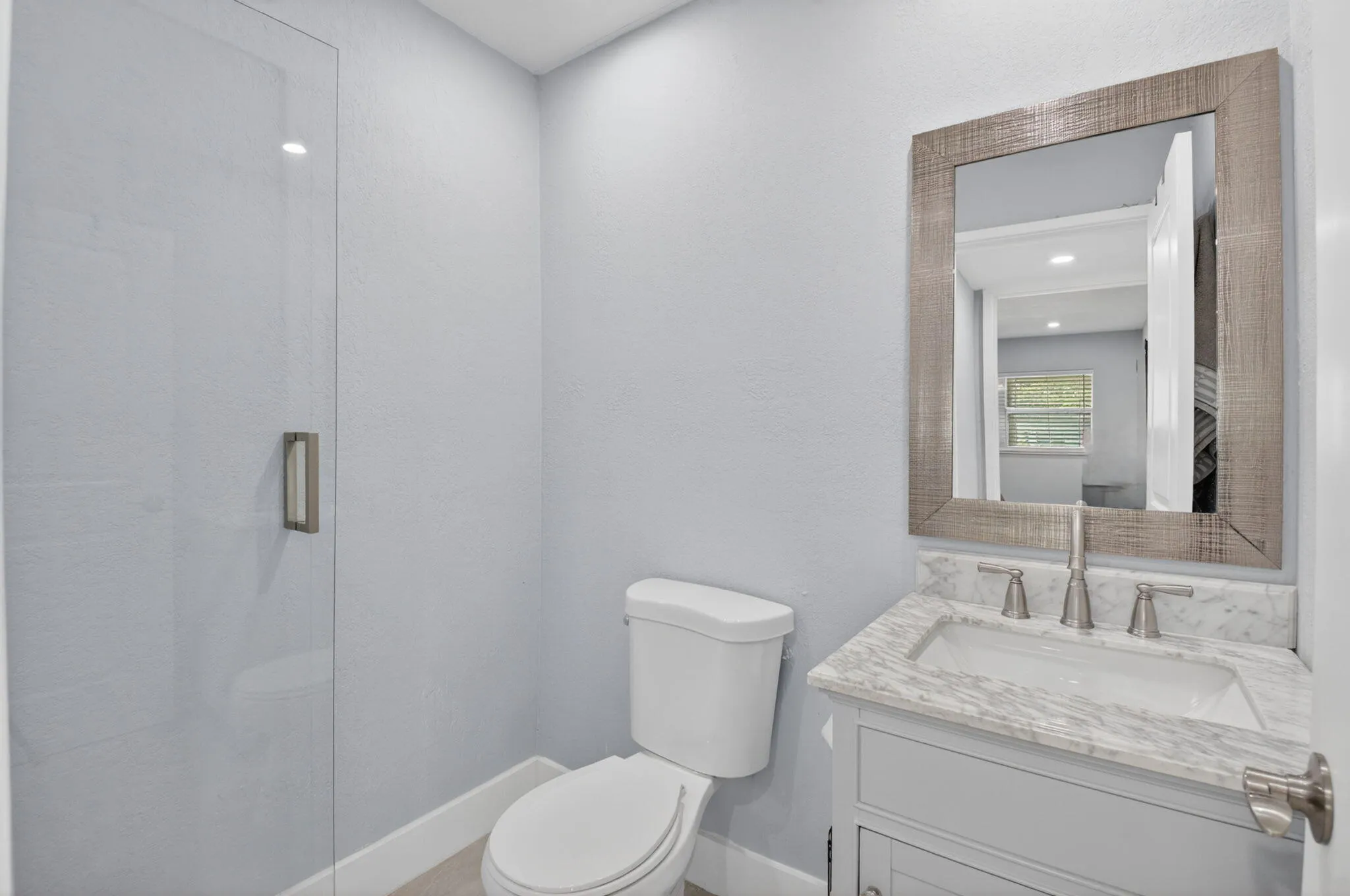 Renovated, Spa-like bathroom with stand-in shower!