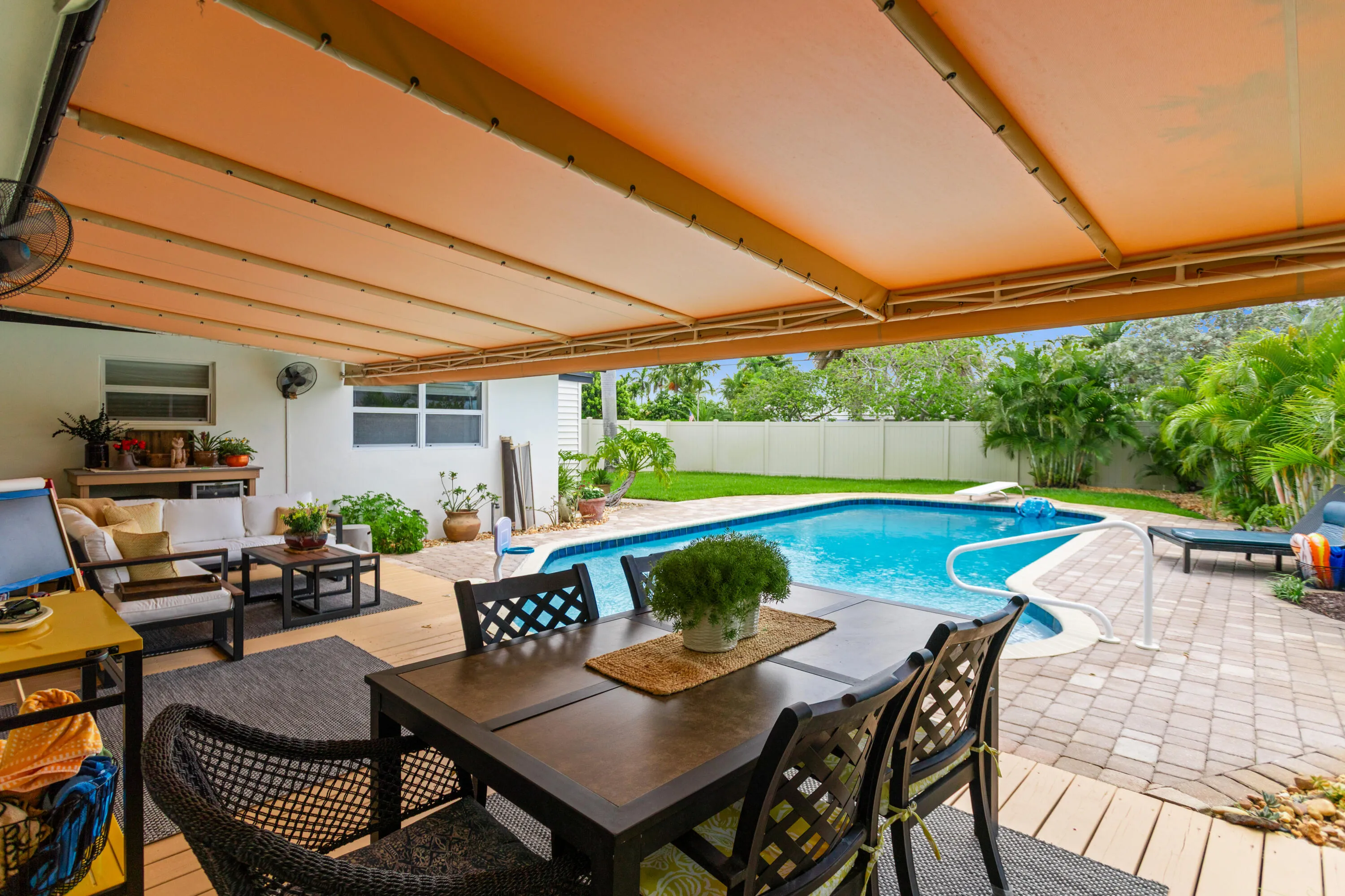 Covered patio over looking pool